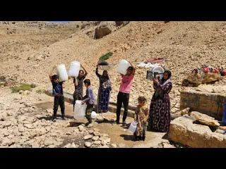 Dena nomadic family Washing dishes and clothes by nomadic