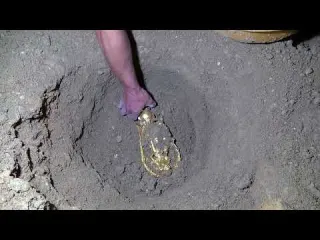 I found a big gold basin with a girl under it