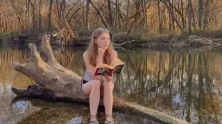 reject modernity read a book in the woods