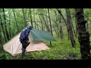 Solo camping in the rain with a teepee tent Heavy rain