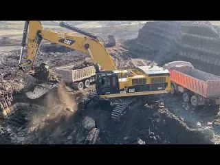 Caterpillar 390D Excavator Loading Overburden On Mercedes