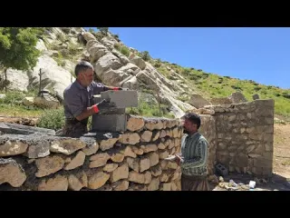 lran nomadic life Rebuilding the walls of a mountain house