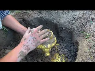 Ghost Cave Treasure Hunt Digs a box and opens it to make a