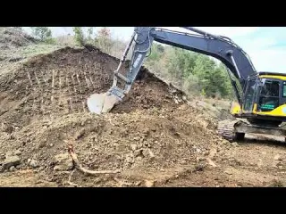 Giant Excavator Breaking Rocks A Great Struggle in Road