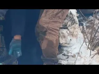 Survival on a Snow Covered Mountain Peak Building Stone