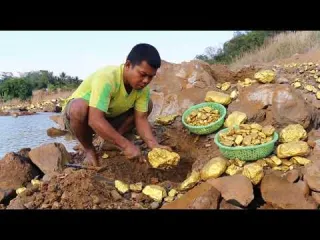 Epic gold mining digging the gold nuggets under stone of