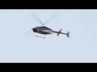 Bell 206l 4 long ranger flying over Great Sound