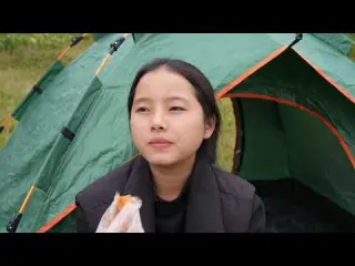 Solo camping in the meadow and enjoying the fresh air