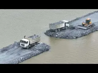 Contact Construction of a road across the lake is almost