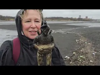 Handfuls of STOLEN JEWELLERY in the drained reservoir