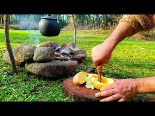 Charred potatoes stuffed with eggs Red skin tent in nature