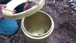 The boy explored the dried up fish pond and unexpectedly