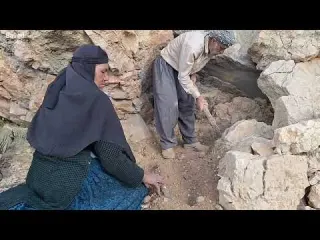 Building a shelter with stones in nature protecting