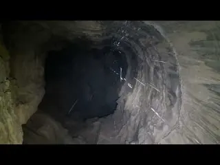 Tight Squeeze Leads To 100 Foot Waterfall