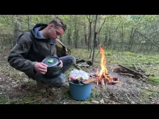 Hiking with a tent and a dog cozy solo camping in the forest