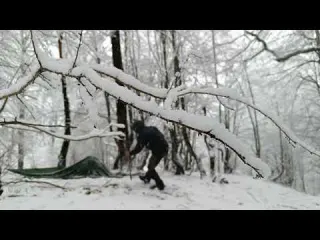 Solo winter camping in the snow Building a shelter with a