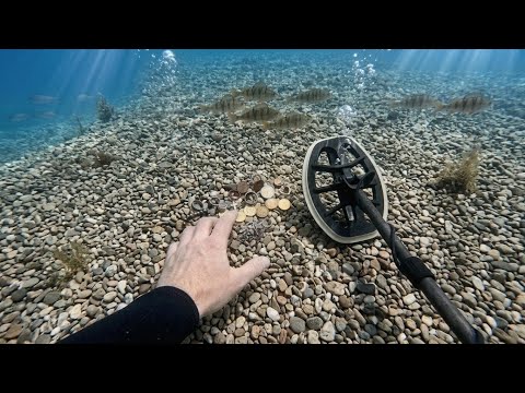 GOLD Earring & SILVER Jewelry Spill in a Clear Lake