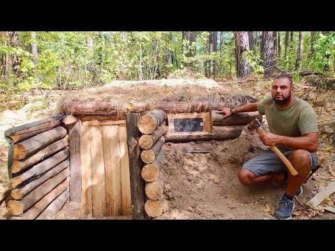 A dugout in a wild forest, a cabin made of logs, I'm