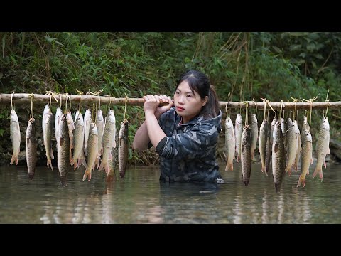 Weaving baskets to catch stream fish, a way to survive in