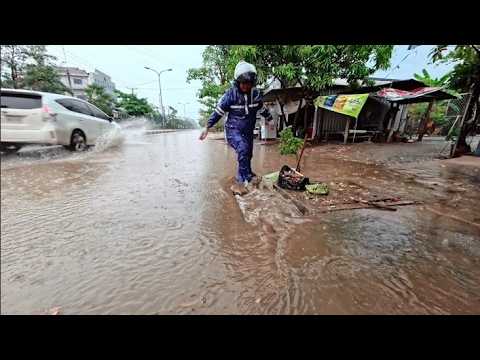 Clogged drains during heavy rains cause flooding on roads