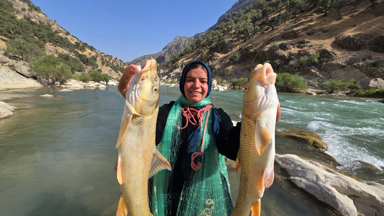 Catching Giant Fish in the Mountain River