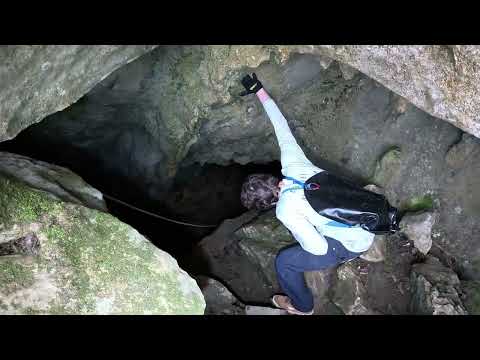 Hole In The Cliff Leads To Massive Borehole Cave