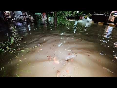 Clogged drains during heavy rains, which caused roads to