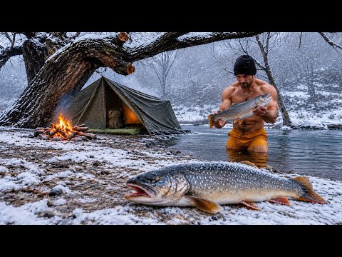 Snow & Rain Camping Hand Fishing in Freezing Water