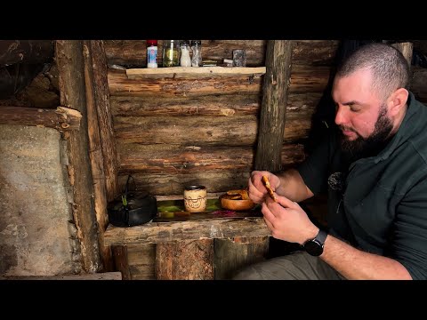 Cozy dugout in the winter forest, flour tortillas on the