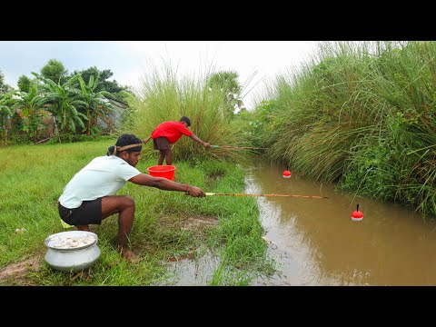 Fishing Video Village boys are fishing in a large canal
