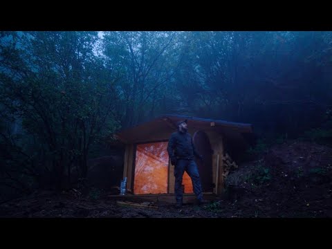 Built a log cabin in the mountains, testing a new stove for