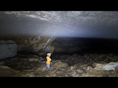 Massive Cave With Clouds Inside