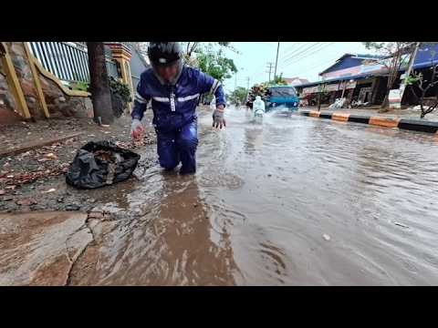 Sewer clogged with garbage after heavy rain