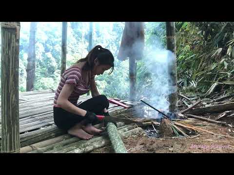 Girl survive in the rain and fog - catching crabs at the