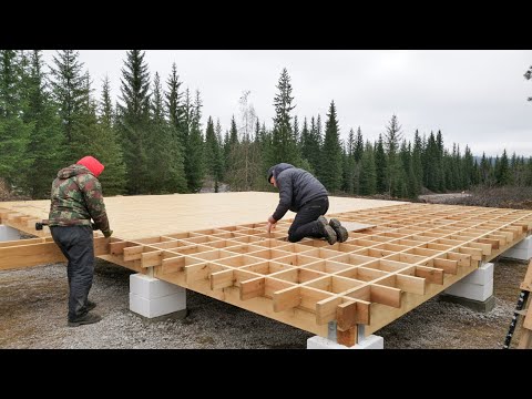 Family build their off-grid cabin in Alaska amidst a