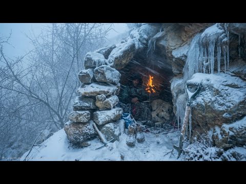 ​Winter Bushcraft in a Blizzard | Building a Stone Shelter