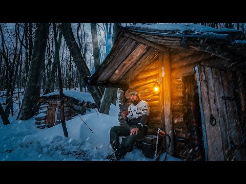My snowmobile broke down, a log cabin in the forest saved