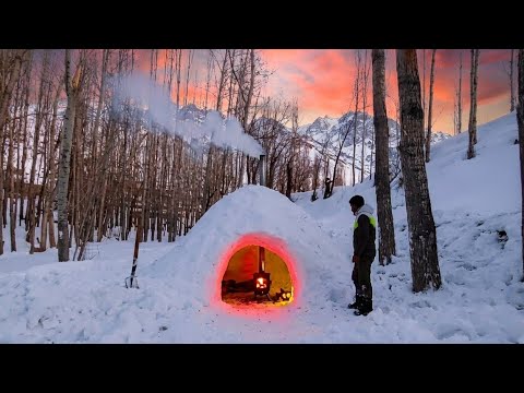Building a warm snow shelter (igloo) on a cold night Solo