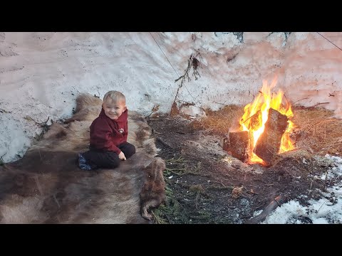 Winter Camping in Bushcraft Shelter with Animal Hides for a