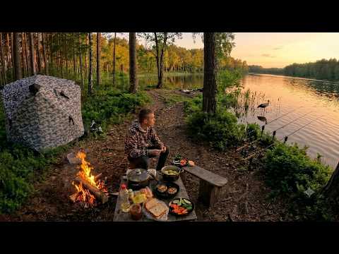 Resting on the lake with a tent, cooking and fishing