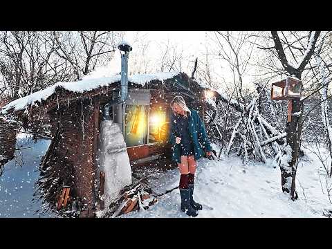 Woman Alone in a Little Reed Hut in Winter Night Snowstorm