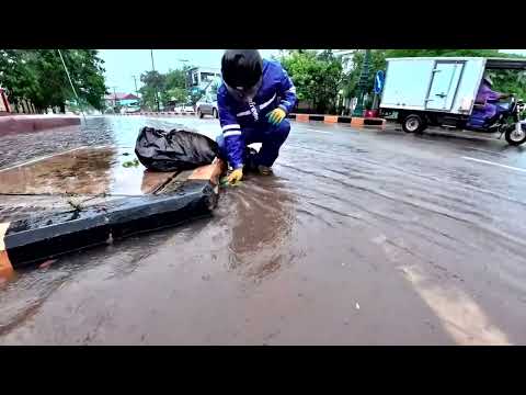 Heavy rains cause roads to flood and drains to become