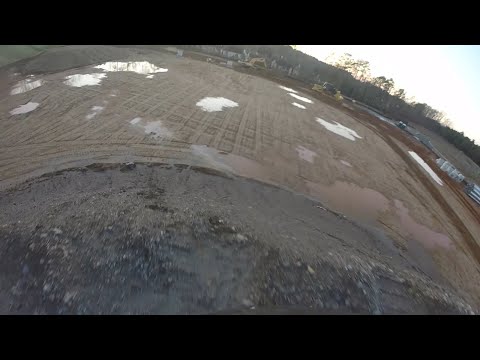 bmxing off a 50 foot tall giant dirt mound
