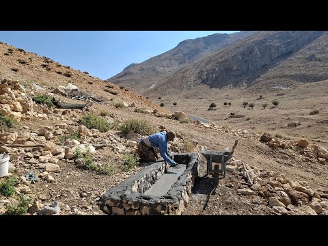 Iran's nomadic life: making a water trough for sheep with
