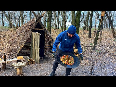 Hut in the forest Outdoor Cooking Cooked fried meat for
