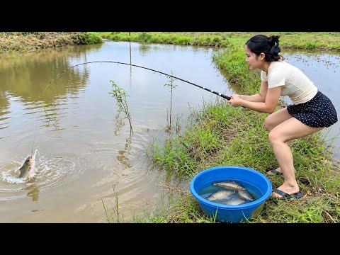 Fishing Girl Catching Fish in an Old Abandoned Pond