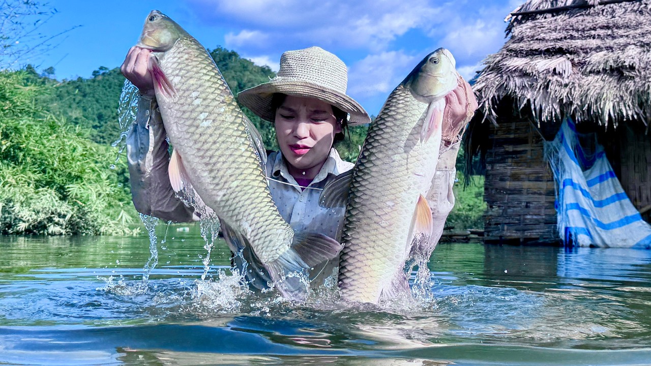 Single mother catches giant fish with bamboo fishing rod