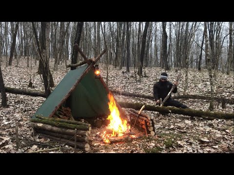 surviving and solo camping in wilderness-cozy shelter: