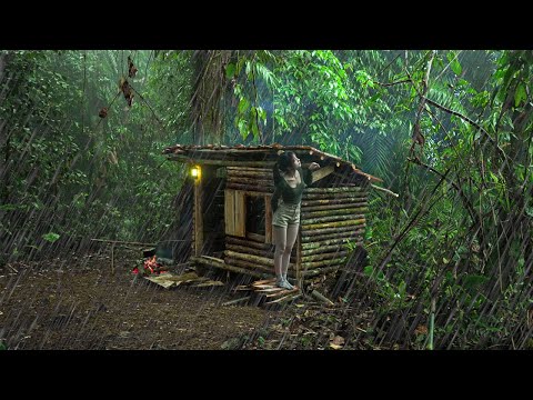 Despite the rain, building wood survival shelter in