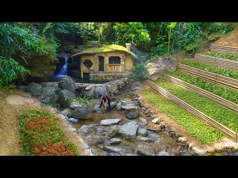 I built a survival house by the waterfall — with a pool,